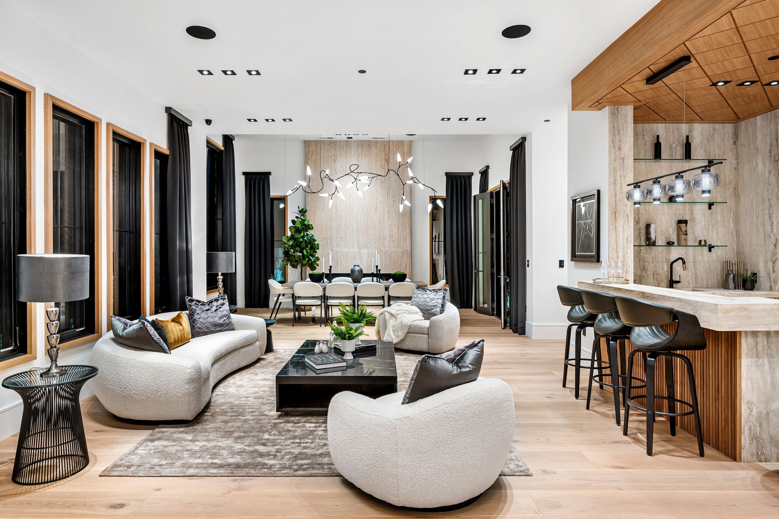 Modern luxury living room with contemporary furniture and bar area
